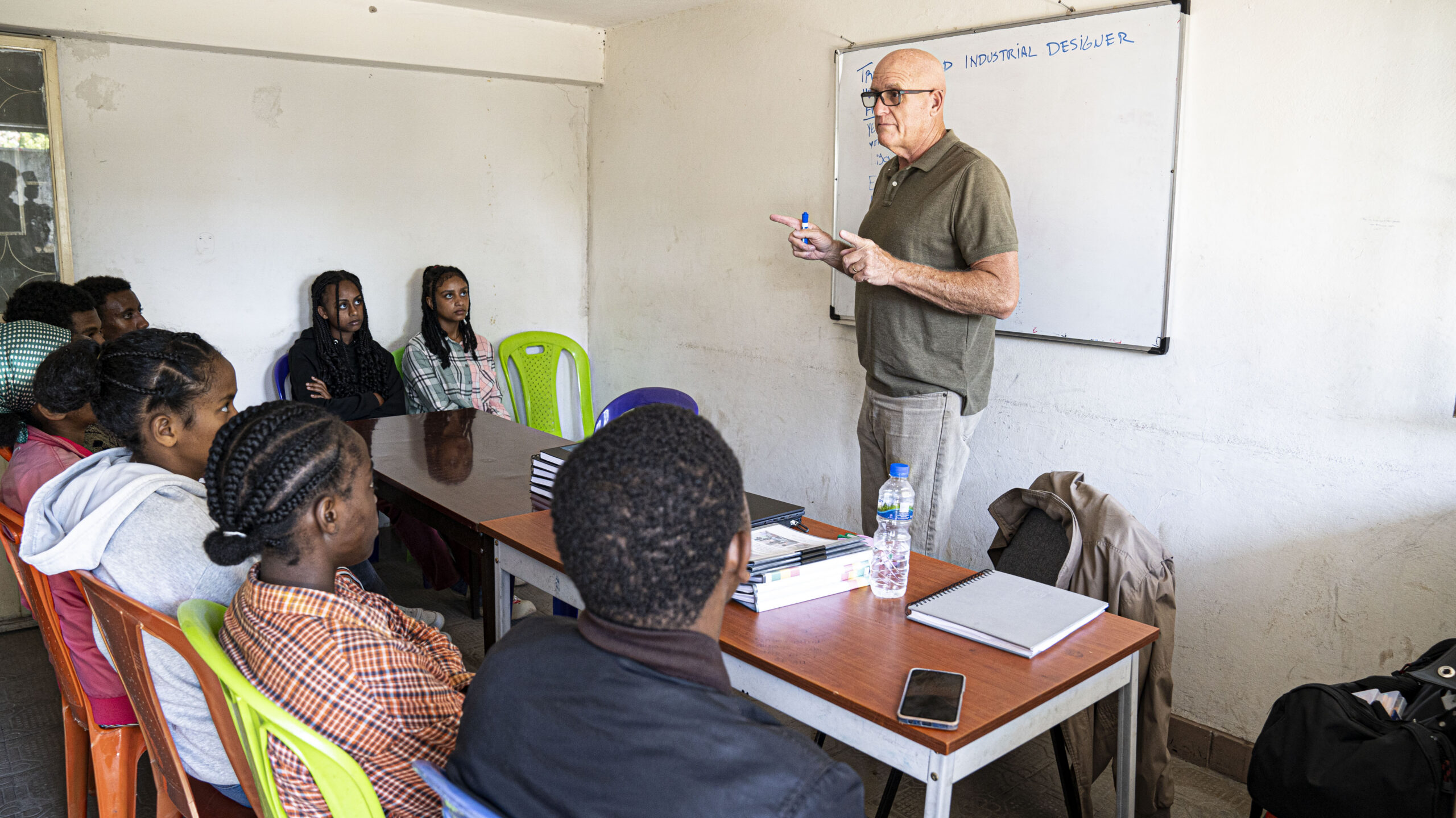An LCE mentor teaching a business and industrial design class to young Ethiopian entrepreneurs within the Collaborative Ventures training program.